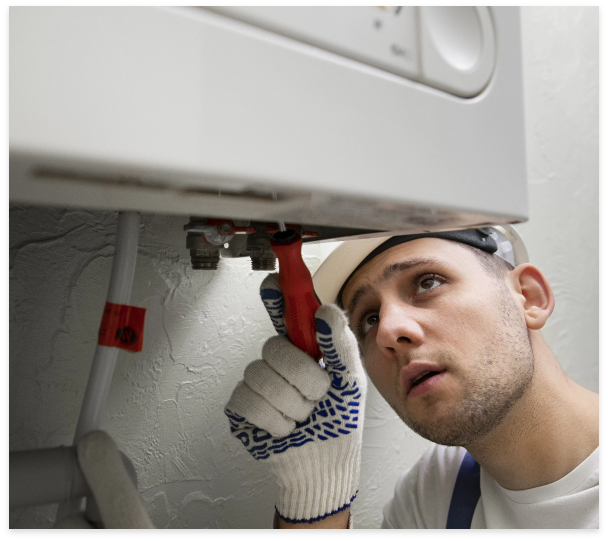 worker-repairing-water-heater (1) HVAC Repair, Installation, Maintenance